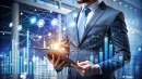 Businessman analyzing financial data on tablet